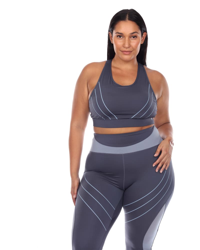 Front of a model wearing a size 1X Cut Out Back Mesh Sports Bra in Blue by White Mark. | dia_product_style_image_id:249450